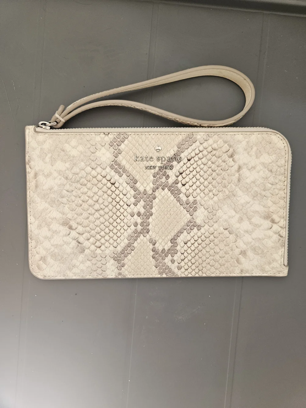 kate spade cream snake-print wristlet with wrist strap
